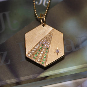 14k gold HOPE hexagon charm with diamonds and garnet in studio