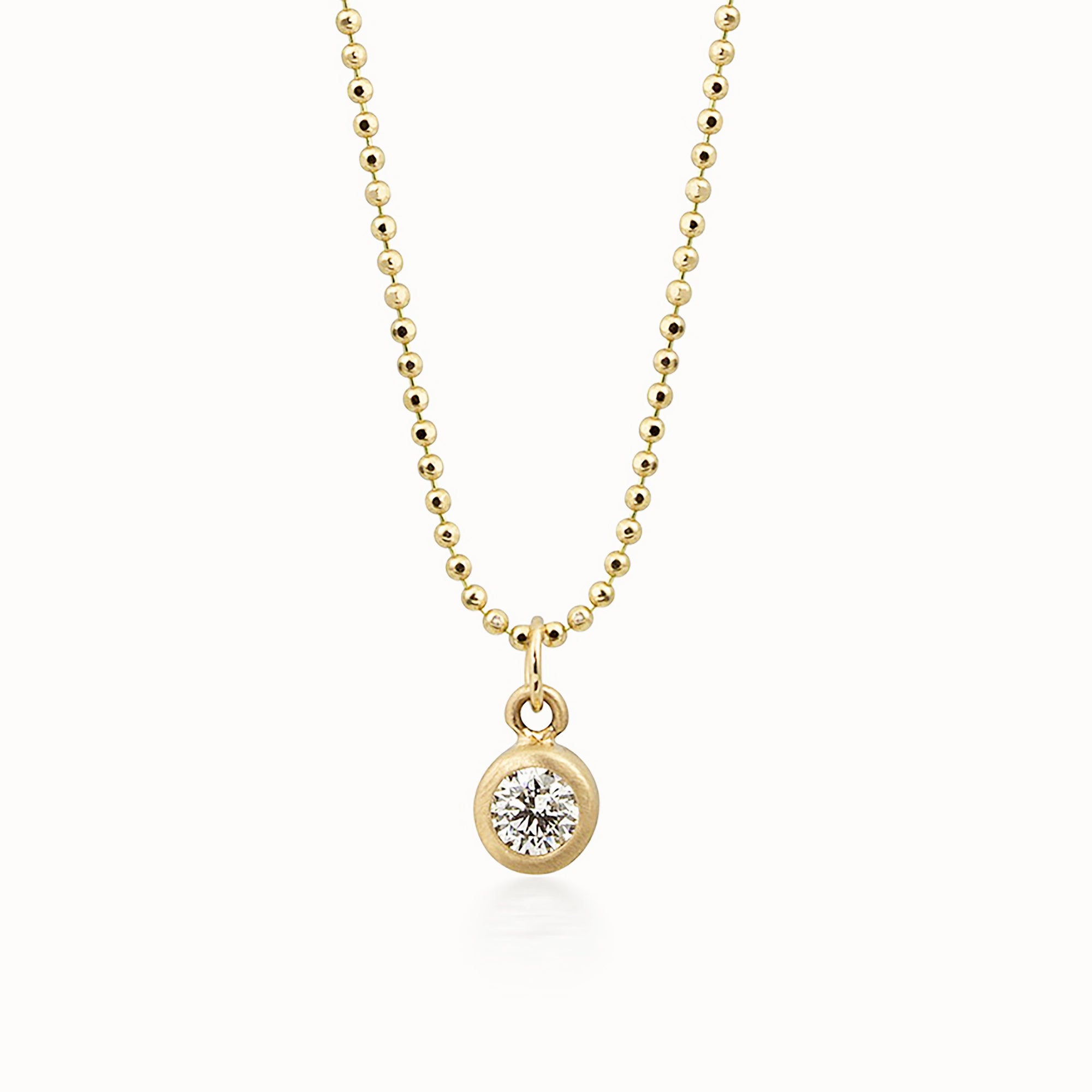 14k yellow gold OTTO diamond pendant in bezel setting