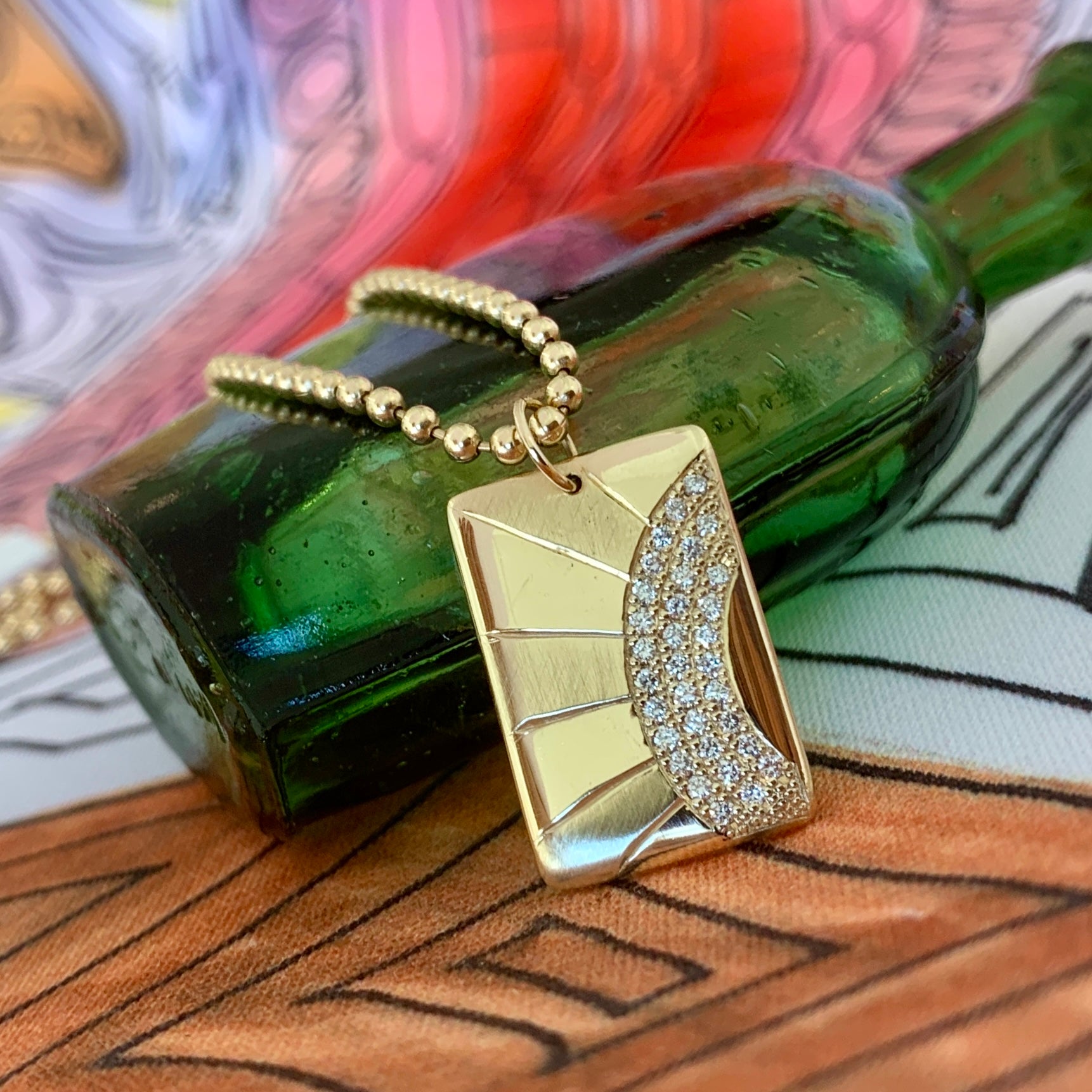 14k gold CALS pendant with side diamond rainbow